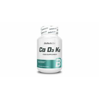 Förpackning med 12 vitaminburkar Biotech USA Ca-D3-K2 - 60 Gélul